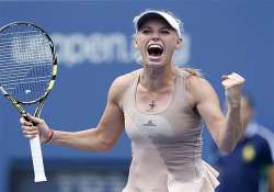 us open caroline wozniacki outlasts sharapova in quarters