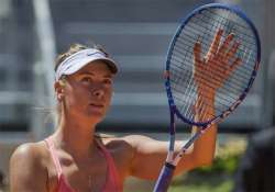 maria sharapova advances to 3rd round of madrid open