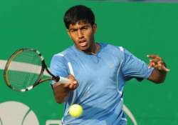 bopanna lifts madrid open trophy with florin mergea