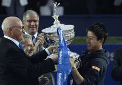 nishikori beats andujar to defend barcelona open title