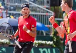 belgium beat canada to reach davis cup semis