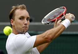 wimbledon isner giant killer darcis azarenka bow out because of injuries