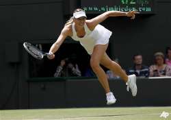 maria sharapova enters round three