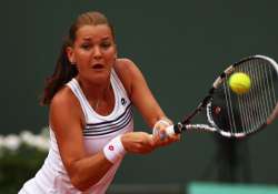 radwanska beats rybarikova in 1st round