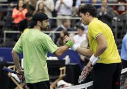 raonic downs becker 6 4 6 4 in memphis semifinal