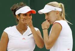 sania elena crash out of wimbledon doubles