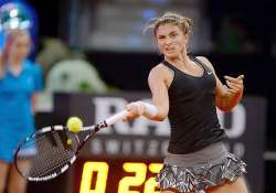 sara errani beats andrea petkovic in 1st round at madrid open