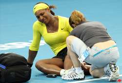 serena williams wins but injures ankle at brisbane