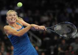 sharapova beats wozniacki in exhibition