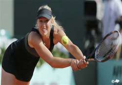 sharapova advances easily at french