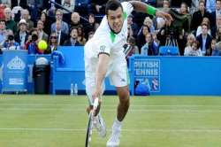 tsonga beats nadal murray roddick advance