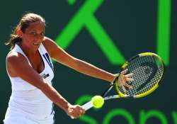 vinci beats johansson in 1st round in barcelona