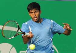 wimbledon bopanna upsets third seeds to enter quarters