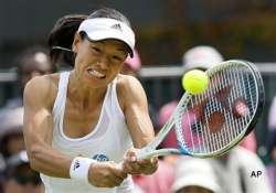 wimbledon date krumm advances to 2nd round