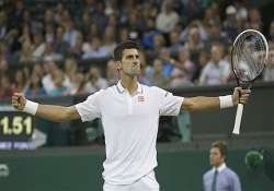 wimbledon novak djokovic beats tsonga to reach quarterfinals