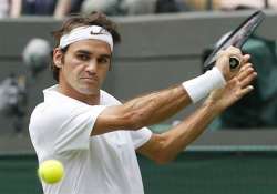 wimbledon roger federer shows no mercy in opener