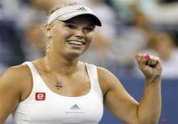 wozniacki coasts to third round