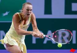 wozniacki seals no. 1 ranking as sharapova pulls out