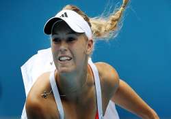 wozniacki advances bartoli upset at kremlin cup