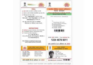 aadhaar is a number not an id card says montek
