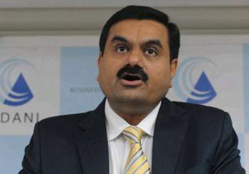 adani group chief meets home minister home secy