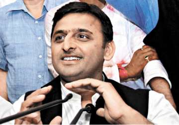 akhilesh favours debate on fdi