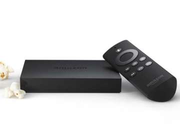 amazon launches internet based tv set top box fire tv