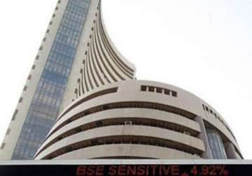 benchmark indices end almost flat ahead of derivatives expiry