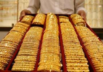 gold down by rs 100 on weak global cues silver recovers