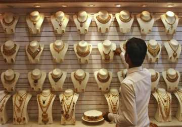 gold edges higher on stray buying silver also advances
