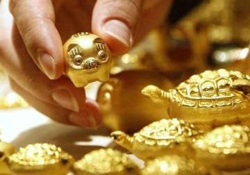 gold ends almost flat in listless trade silver gains