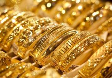 gold futures fall to rs 27 641 on profit booking weak global cues