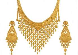 gold prices fall further by rs 130 on weak global cues