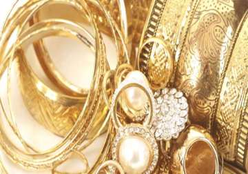 gold rebounds on fresh demand silver firms up global cues