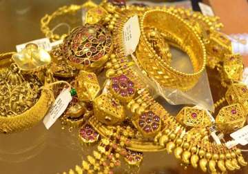 gold scales to eight month high at rs 31 525