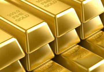 gold slips from nearly 4 month high down rs. 475