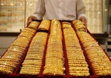gold snaps four day falling trend recovers on global cues