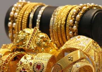 gold up on wedding season demand global cues