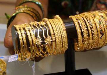 gold dips below rs 28k mark on weak global cues