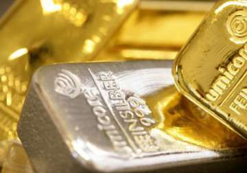 gold down by rs 40 silver rises by rs 300