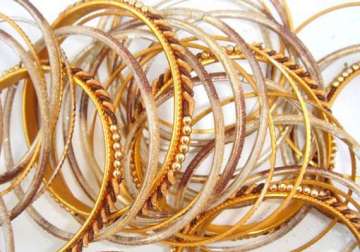 gold tumbles by rs 500 silver sheds rs 1700