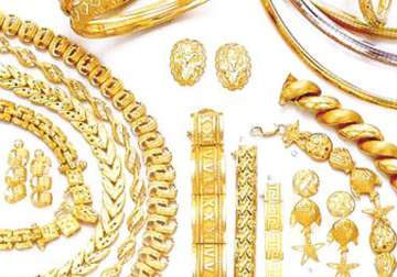 gold up by rs 50 silver falls by rs 170