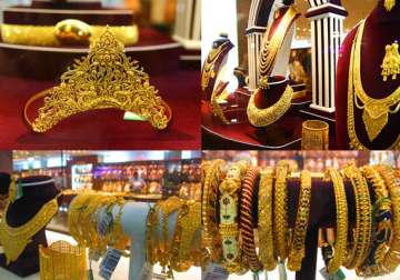 gold prices dip below 31k level