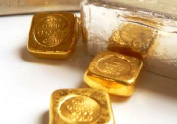 gold slips down by rs 30