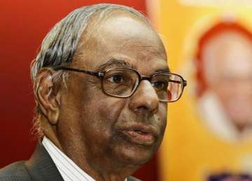 govt determined to contain fiscal deficit says rangarajan