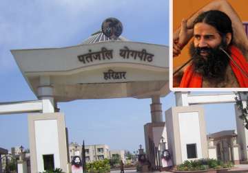 i t to cancel charitable status of ramdev trust withdraw exemptions
