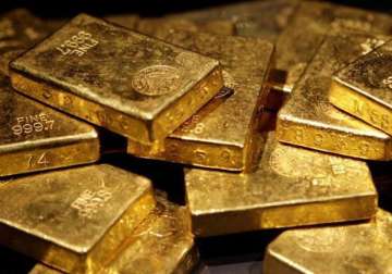 gold plunges rs 180 on global cues snaps two day rally