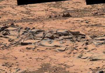 nasa s curiosity rover to probe mysterious rocks on mars