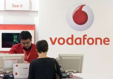 vodafone faces asset seizures over non payment of rs 14 200 cr tax bil