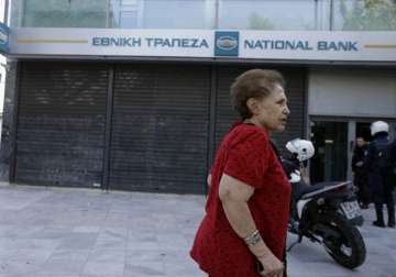 greece debt crisis banks closed atm cash withdrawals limited